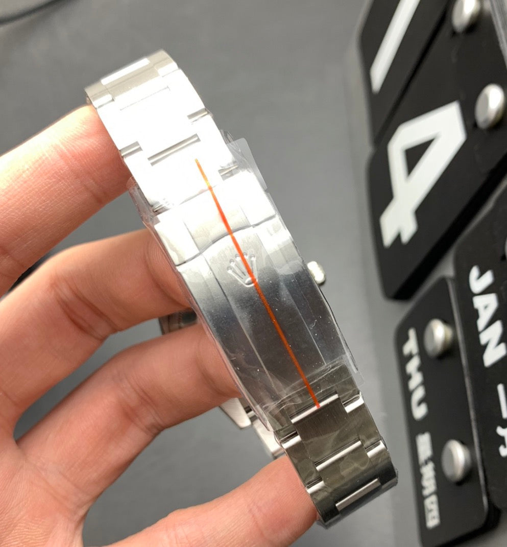 Rolex Oyster Perpetual Red Dial