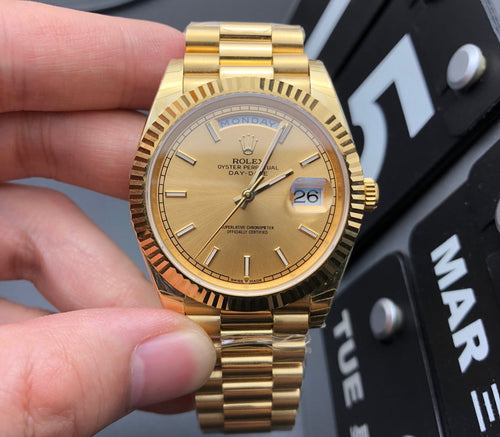 Rolex Oyster Perpetual Day-Date Yellow Gold And Fluted Bezel